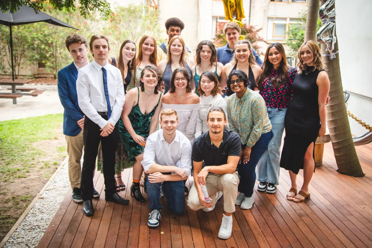 Robert Menzies College Student Association Executive team together on the college deck