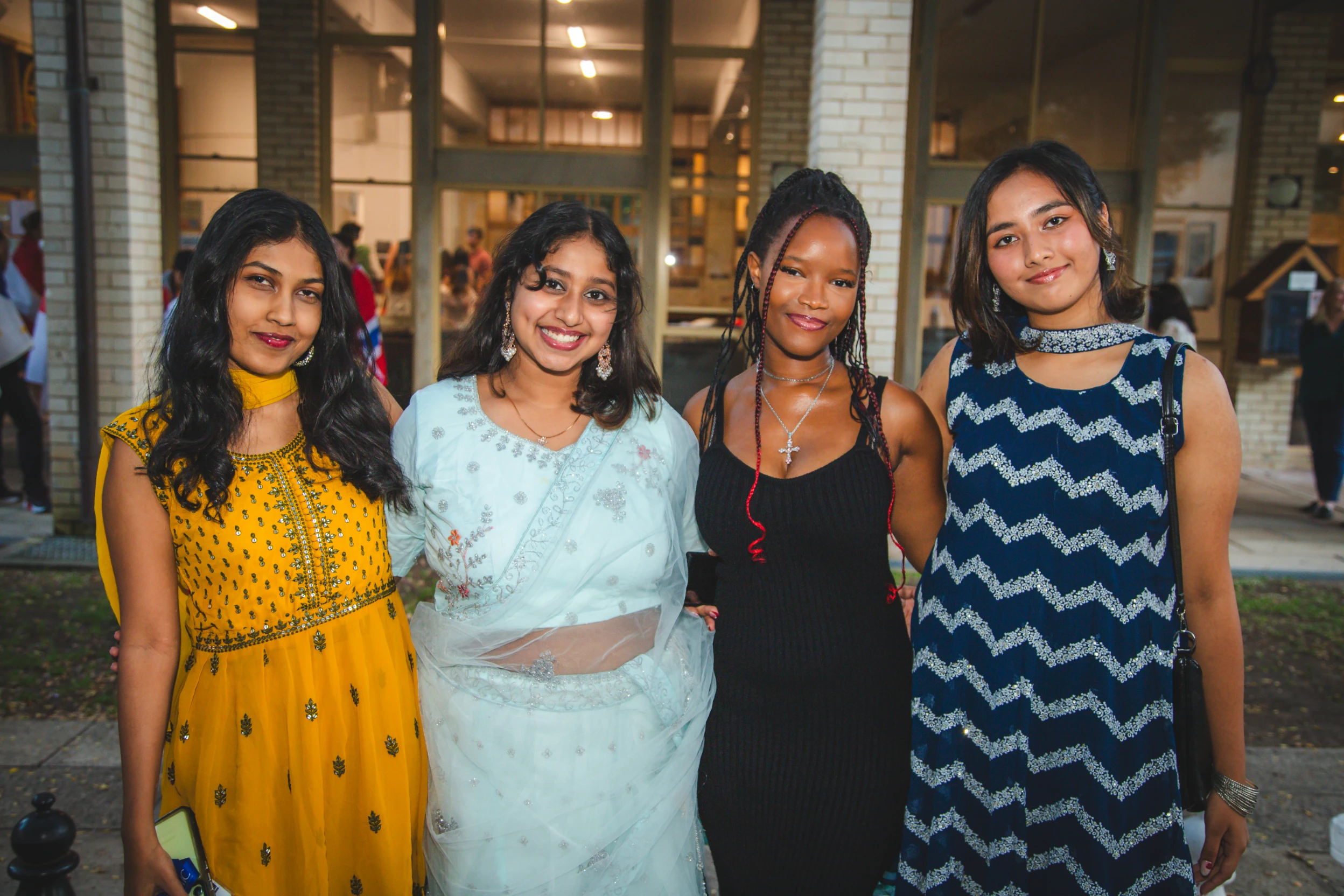 Students dressed in cultural attire at the Robert Menzies College International Dinner 2025