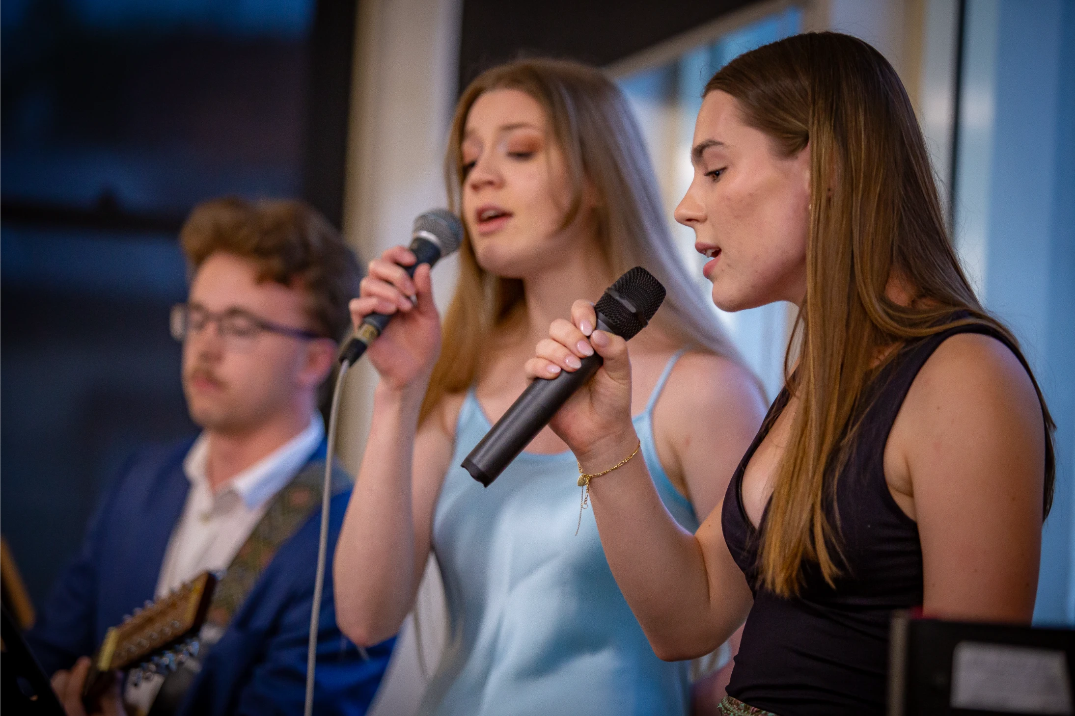 Students performing live music at the Robert Menzies College Valedictorian Dinner.