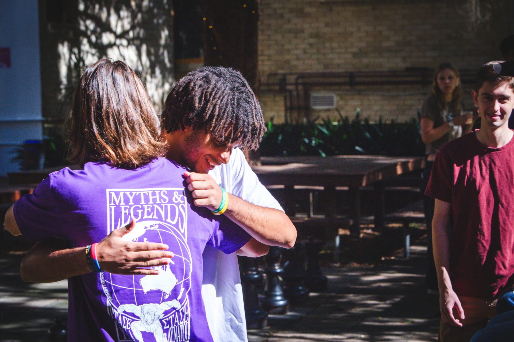 Students greeting each other with a hug at Robert Menzies College Welcome Day 2025