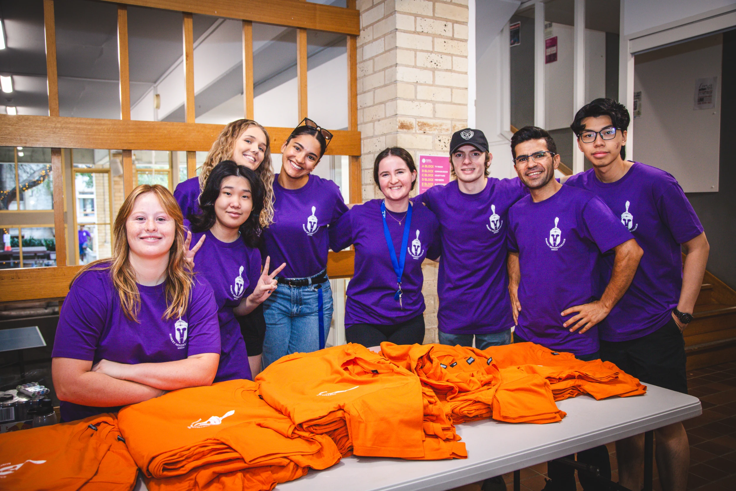 Robert Menzies College student leaders in purple shirts at Welcome Day 2025, helping new students settle in